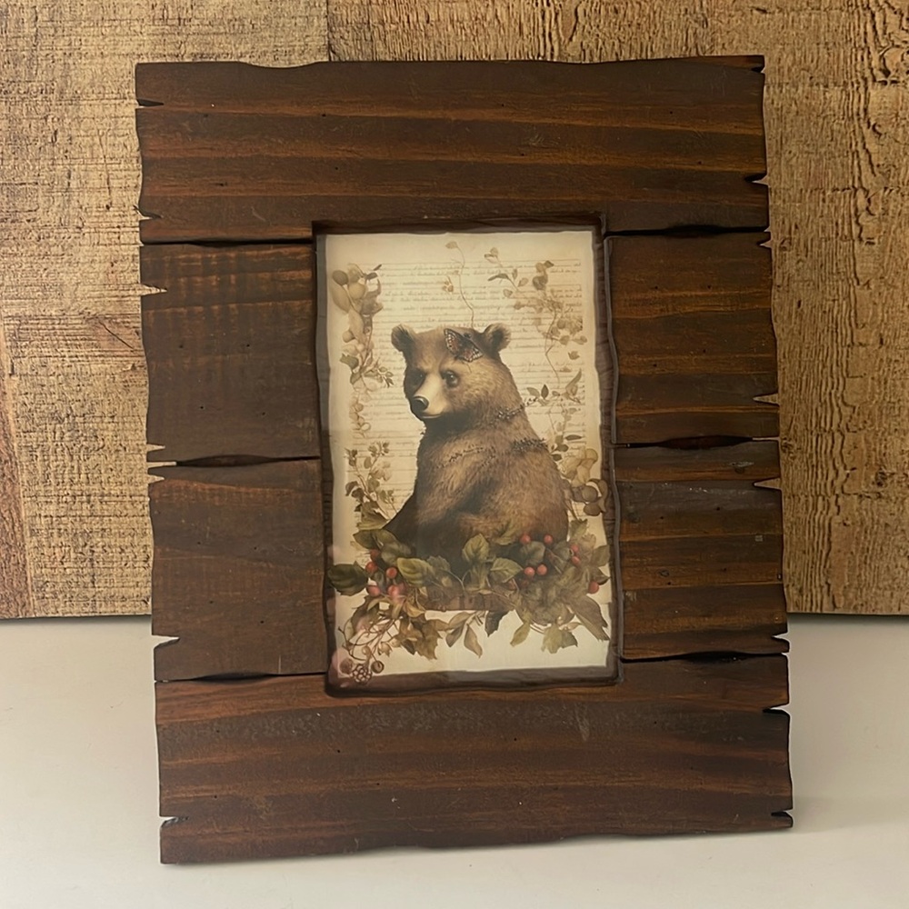Framed bear and butterfly art
